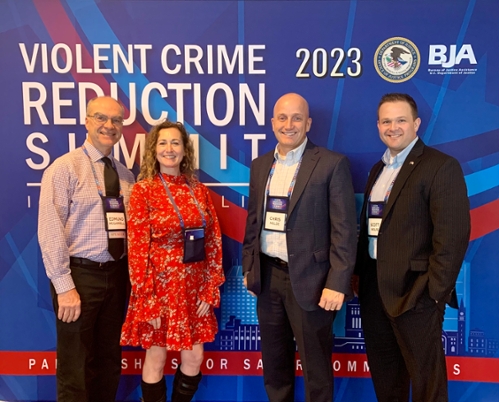 Photo of Dr. Ed McGarrell, Heather Perez, Dr. Chris Melde, and Dr. Scott Wolfe at the 2023 Violent Crime Reduction Summit